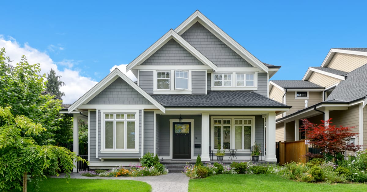 Home exterior with gray siding and covered front porch
